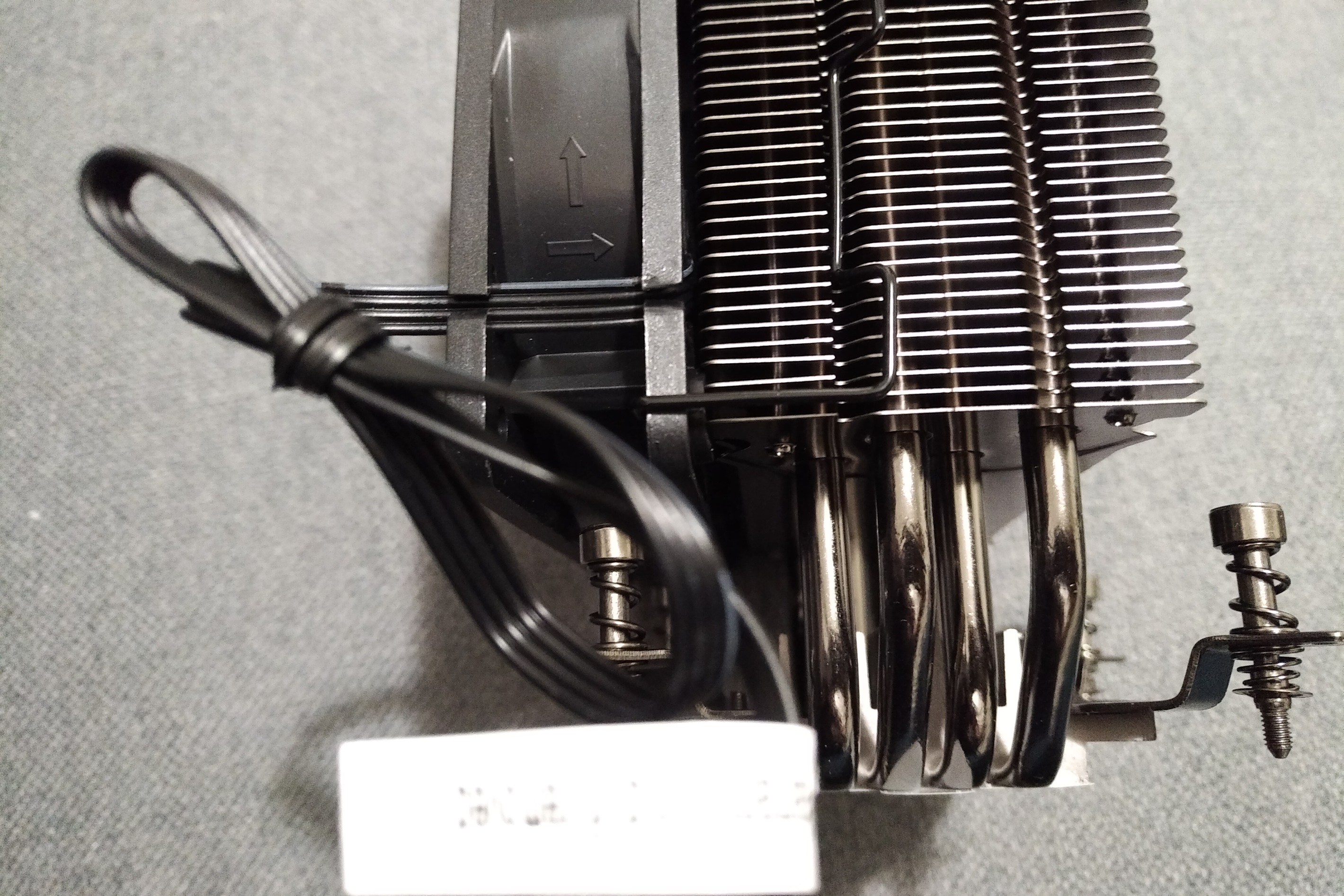 Arrows on fan indicating air flow direction