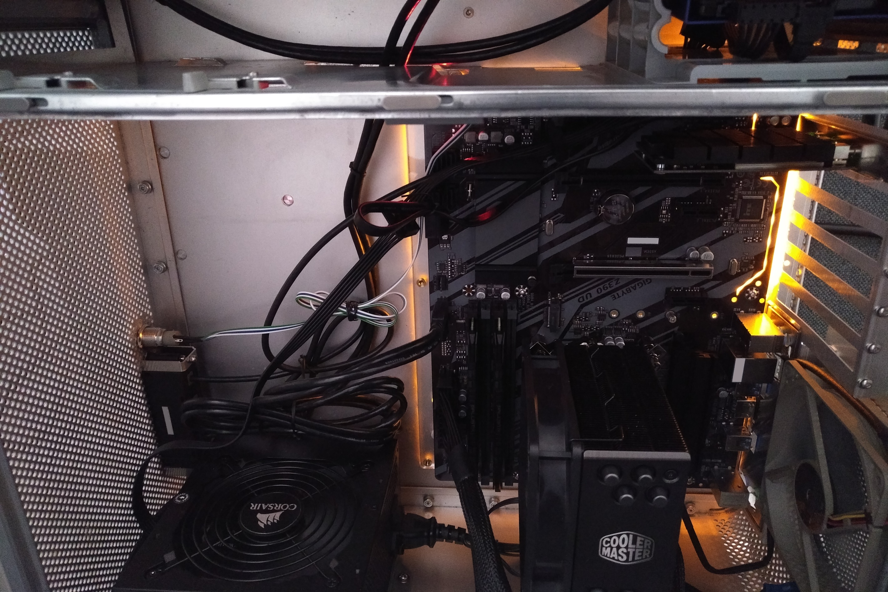 Finished interior powered on. Air sent vertically out of PSU, through CPU fan, and out the case fan.
