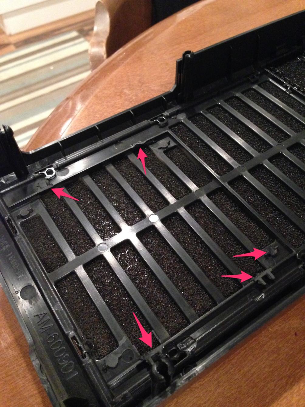 78773-had-use-my-dremel-cut-off-these-tabs-highlighted-arrows-fit-front-panel-case-back-after-installing-h60-cooler.jpg